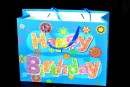 Happy birthday Glitter Die-Cut Large Paper Gift bag with ribbon straps- 4 colours (pack of 12)